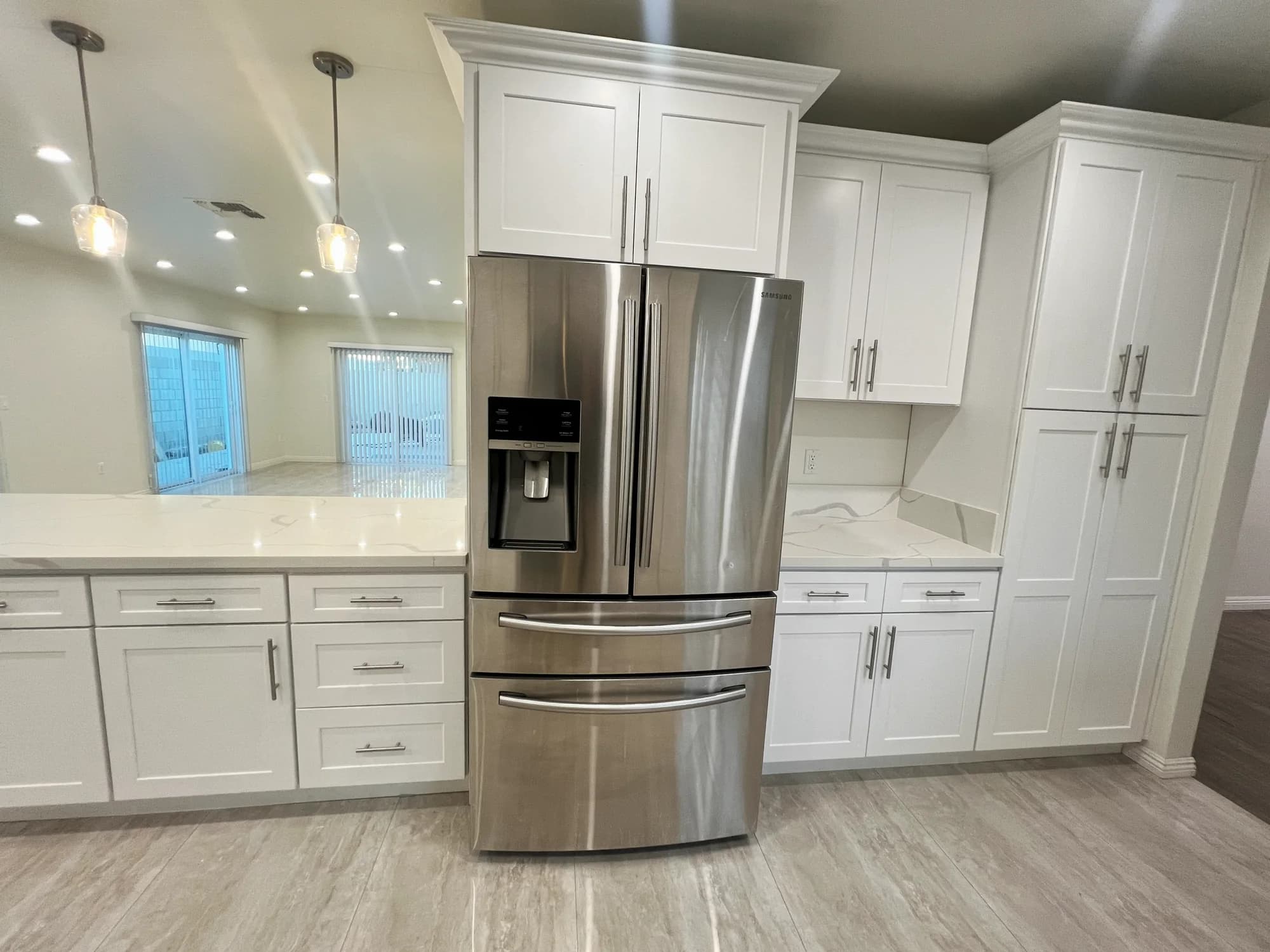 Kitchen with quartz counters and stainless appliances
