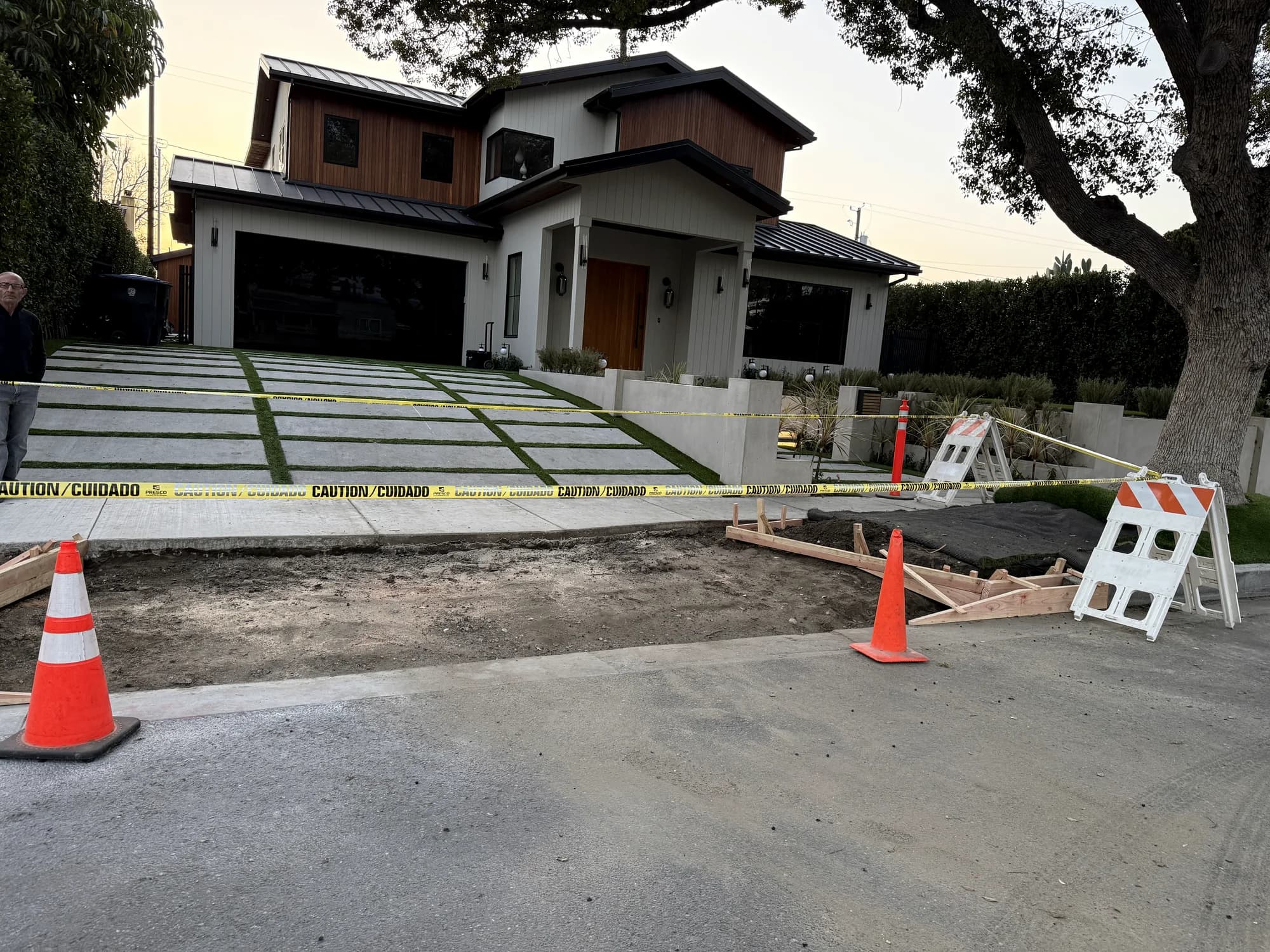 Contemporary home with banded concrete drive