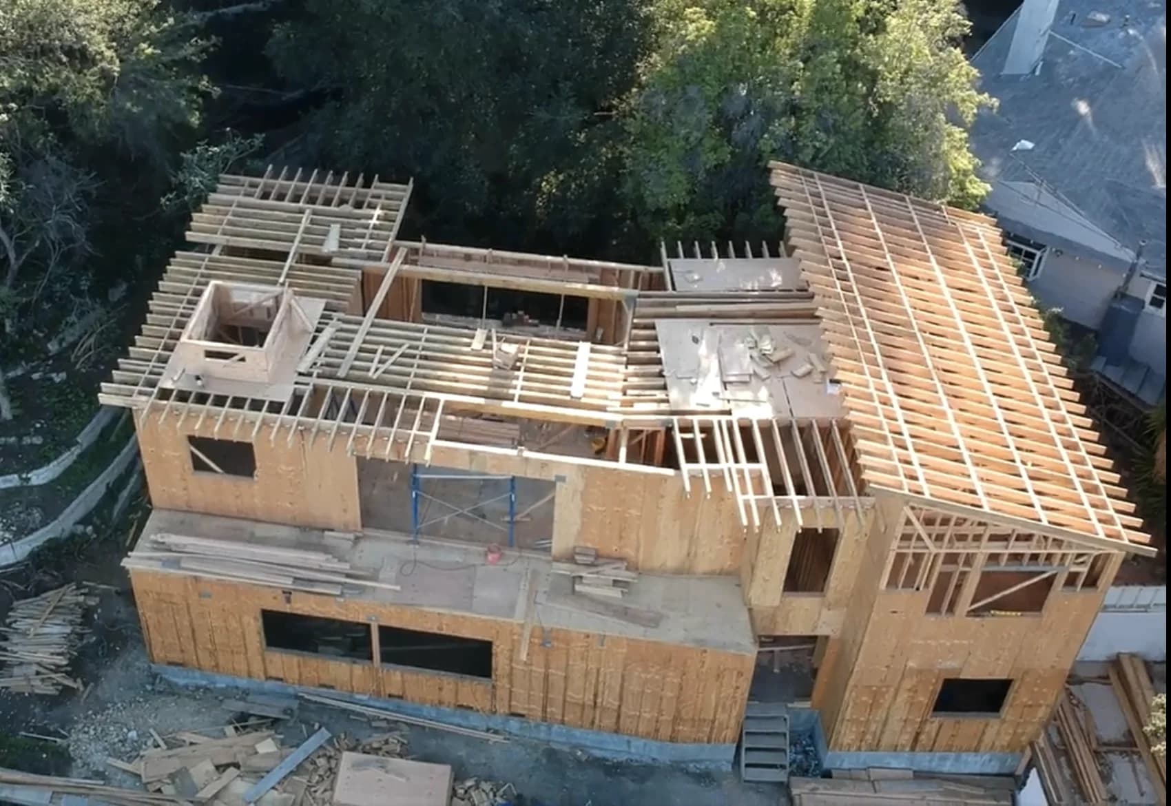 Aerial view of a residence under frame by APW Builders