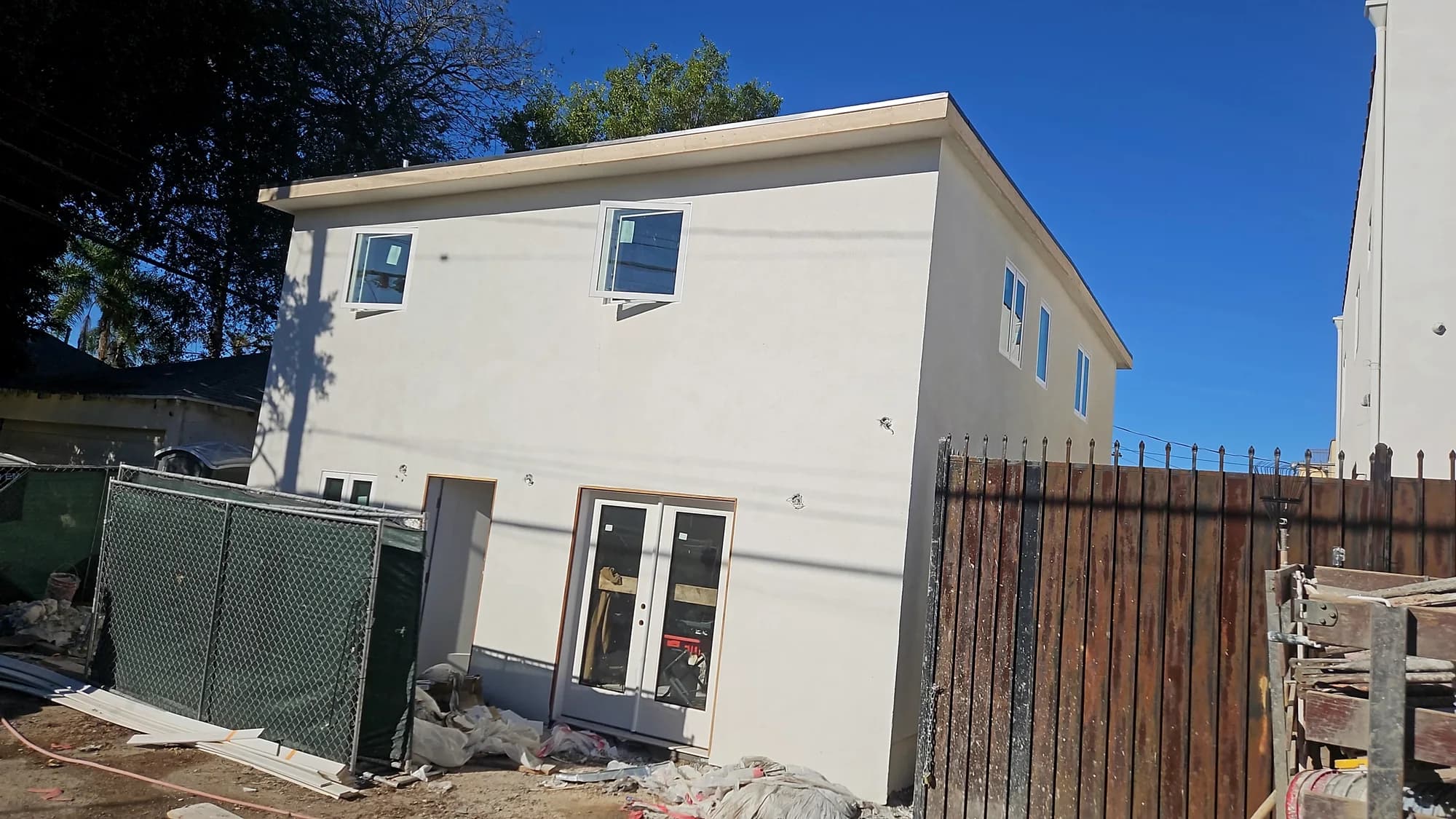 Completed multi-unit residential building by APW Builders